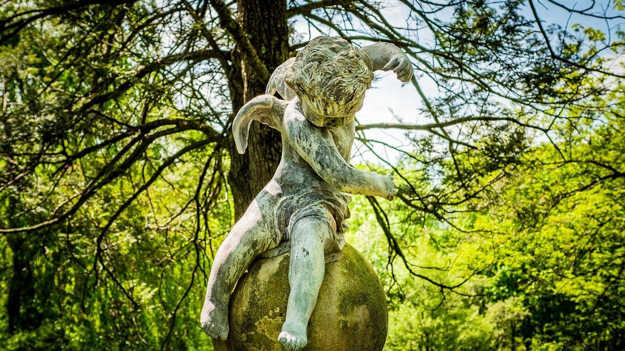 A sculpture of Cupid with his arrow