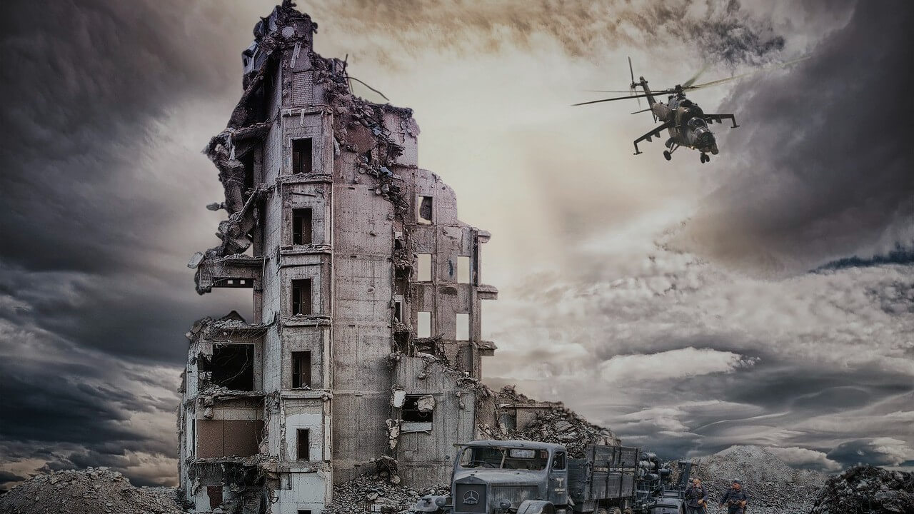 A city ruined and destroyed by war and a helicopter flying overhead